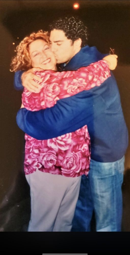 Yeron sharing a hug